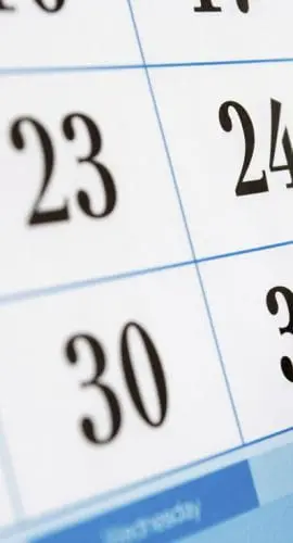 A close-up of a calendar page shows dates with a pencil pointing to the 31st.